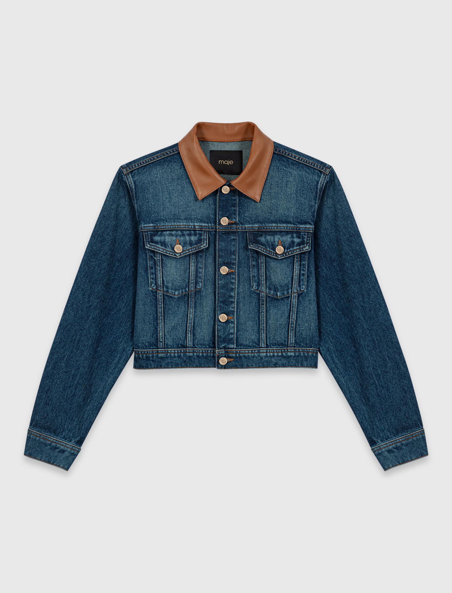 Жіноча джинсова куртка зі шкіряним коміром