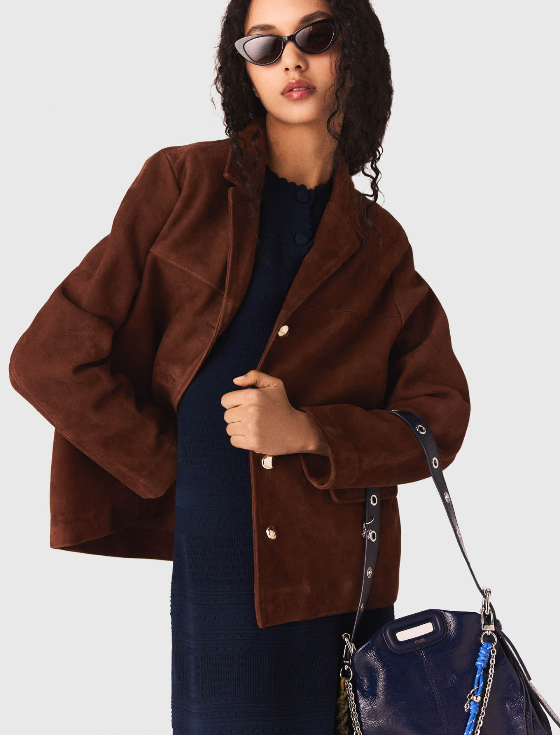 Жіноча коричнева замшева куртка Жіноча коричнева замшева куртка