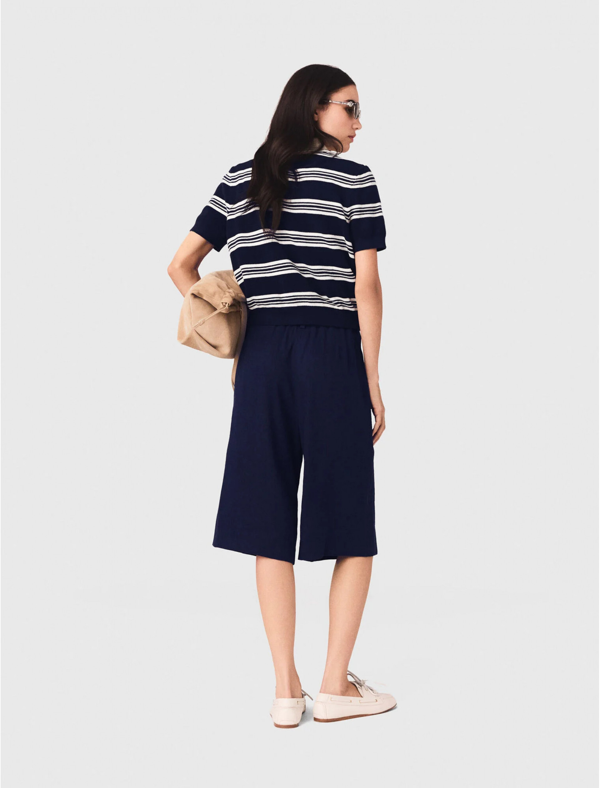 Жіноче смугасте поло зі стразами на комірі Жіноче смугасте поло зі стразами на комірі