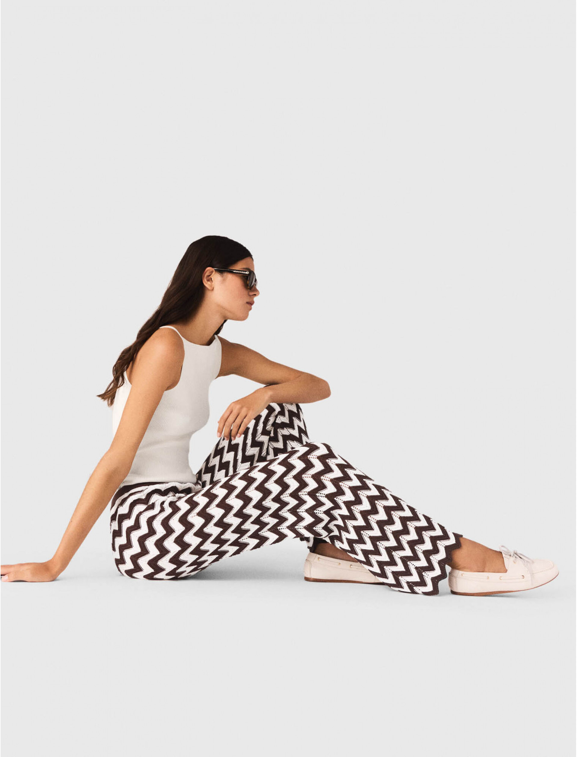 Жіночі в'язані брюки із зигзагоподібним візерунком