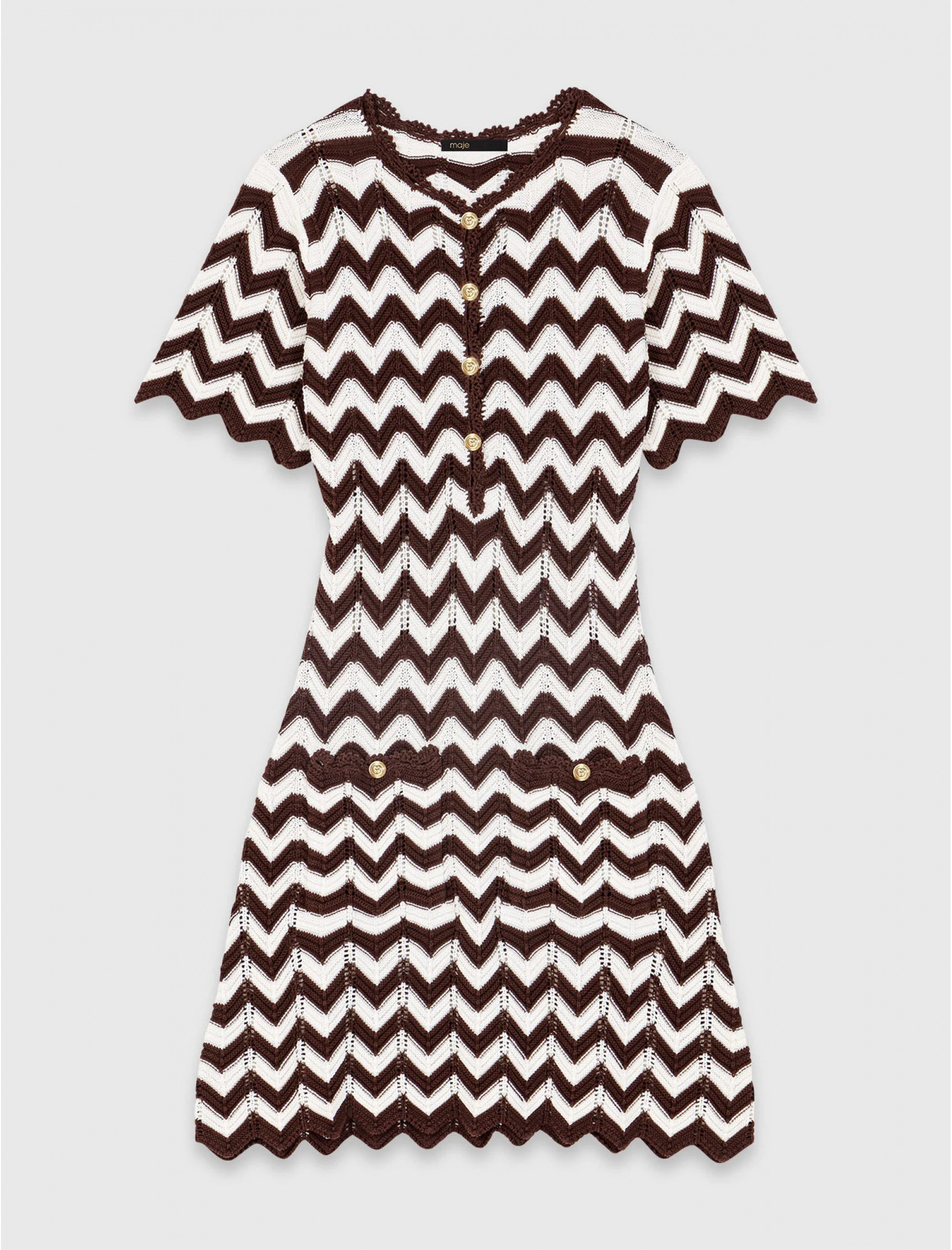 Жіноча в'язана сукня із зигзагоподібним візерунком