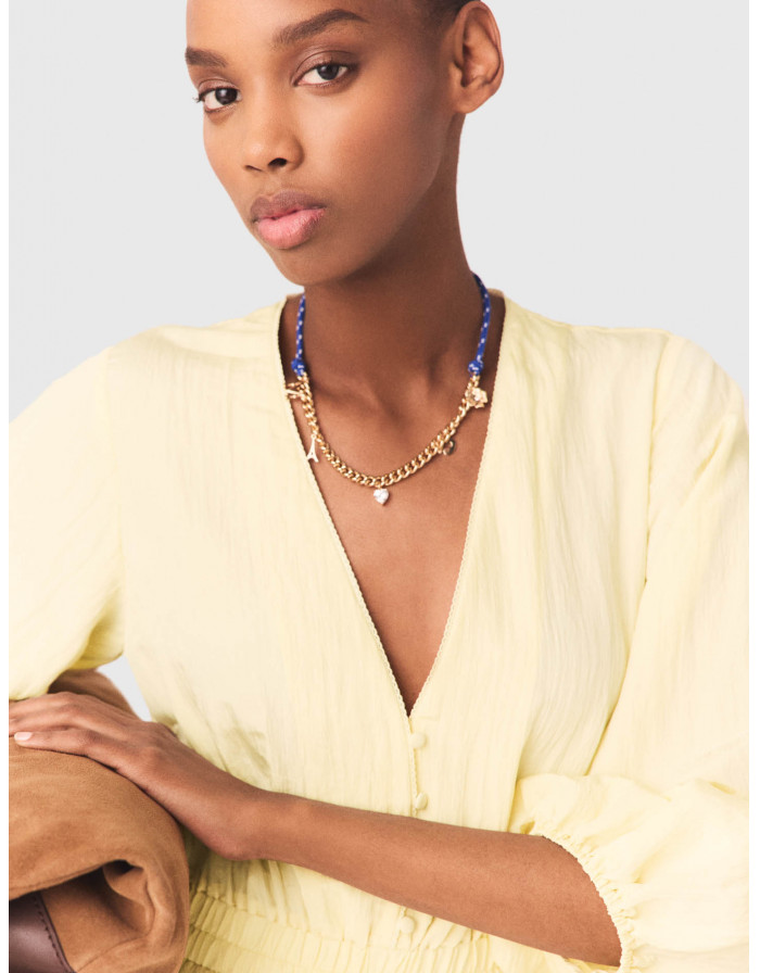 Жіноча коротка сукня з оборками