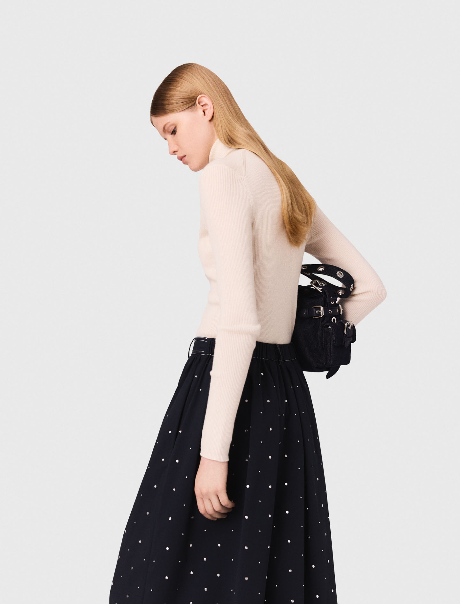 Жіноча молочна водолазка з вовни Жіноча молочна водолазка з вовни