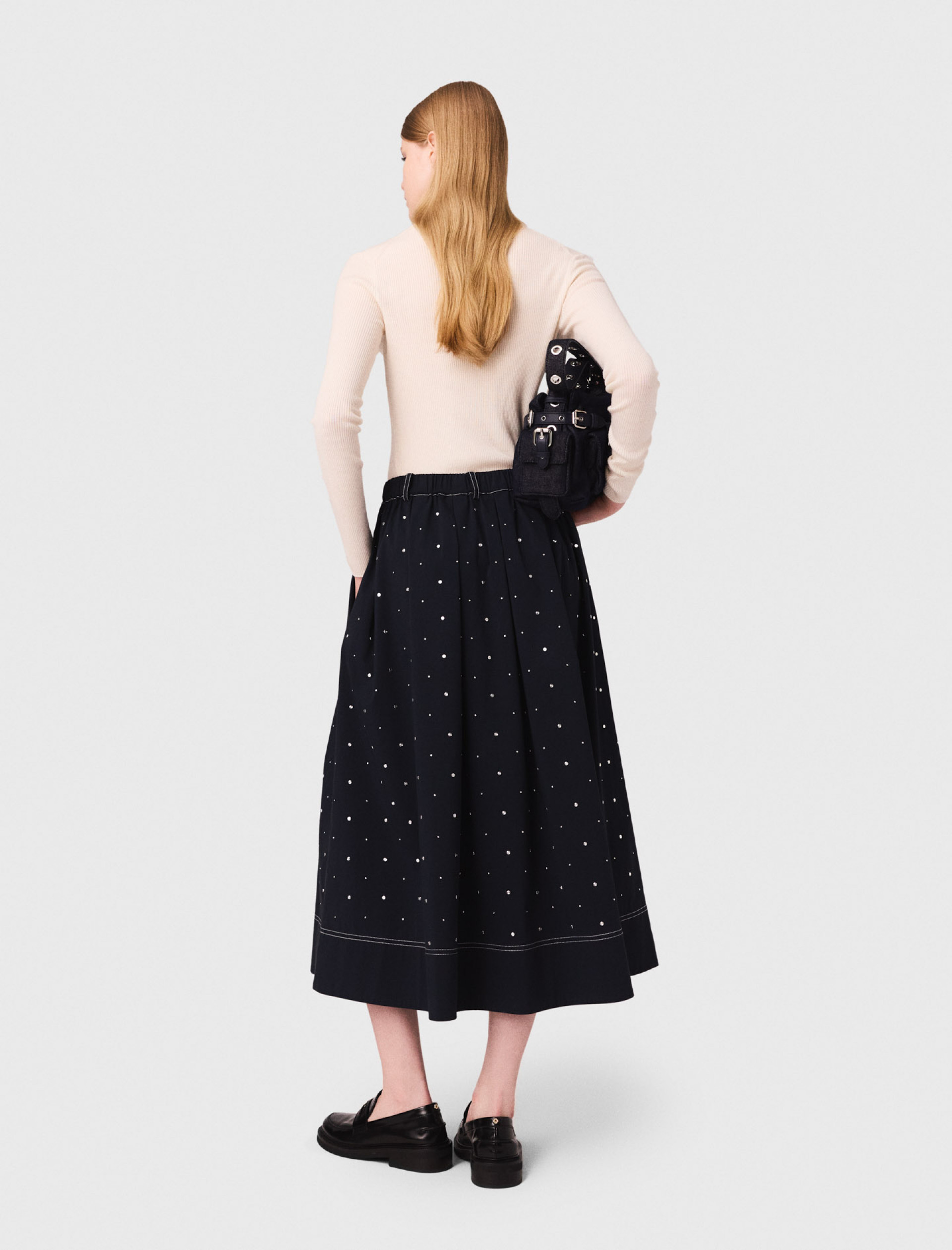 Жіноча молочна водолазка з вовни Жіноча молочна водолазка з вовни